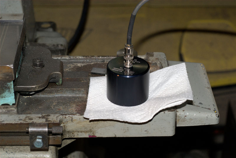 photo of accelerometer on grinder table